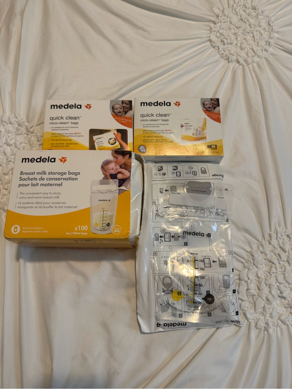 Medela Breast Milk Storage and Quick Clean Bags in White and Yellow